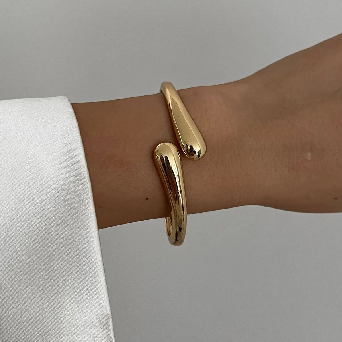 Elariah Bold Irregular Gold Wide Cuff Bangle – Statement Glossy Geometric Bracelet (6cm)
