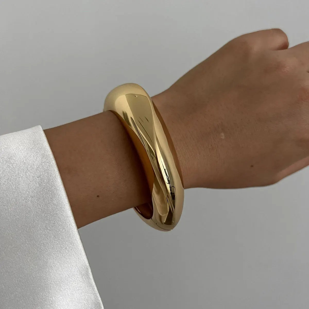Elariah Bold Irregular Gold Wide Cuff Bangle – Statement Glossy Geometric Bracelet (6cm)