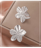 Boucles d'oreilles à tige Unift vintage en forme de fleur pour femme – Bijou bohème tendance en acier inoxydable plaqué or 14 carats