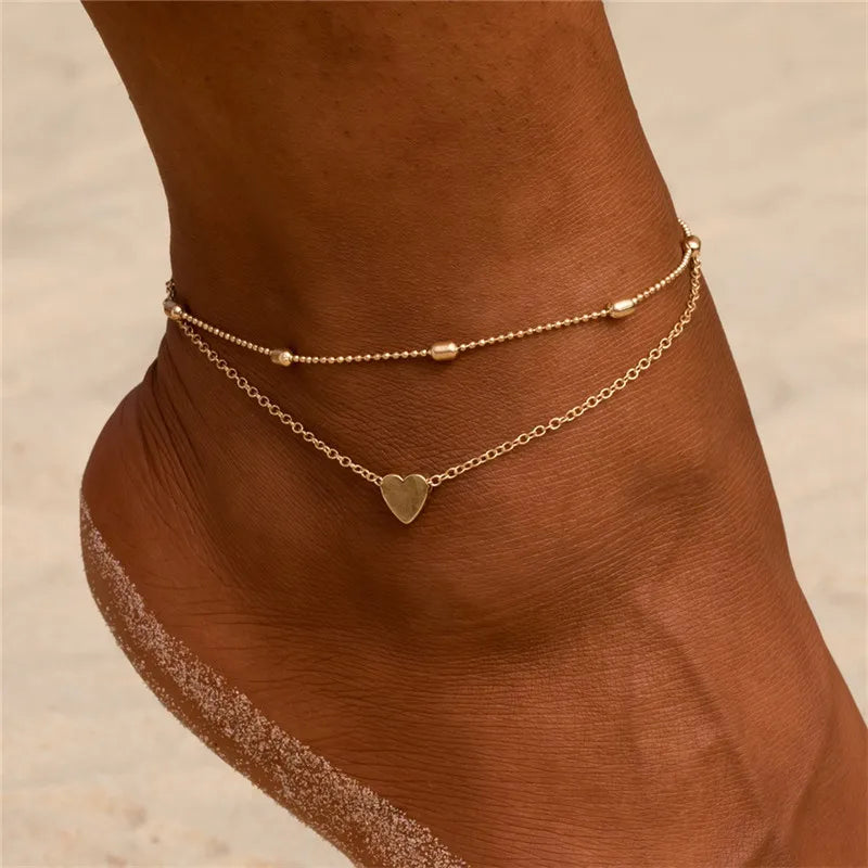 Elegant boho anklet with pearls and shell charm – perfect for beach, weddings, and everyday style.