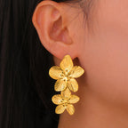Boucles d'oreilles à tige Unift vintage en forme de fleur pour femme – Bijou bohème tendance en acier inoxydable plaqué or 14 carats