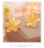 Boucles d'oreilles à tige Unift vintage en forme de fleur pour femme – Bijou bohème tendance en acier inoxydable plaqué or 14 carats