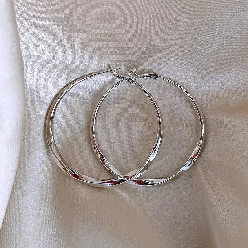 Mobius Twist Gold Hoop Earrings – Classic 50mm Statement Hoops for Women
